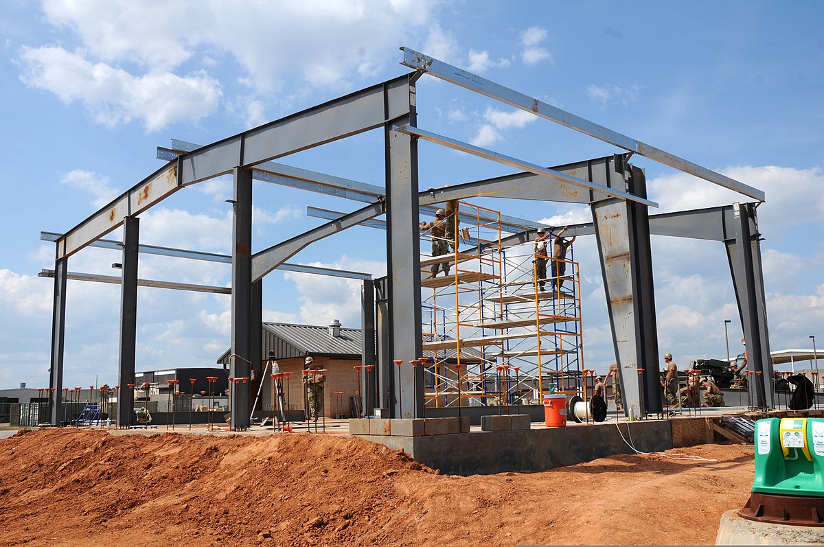 Pre-Engineered Buildings (PEBs) are structures made up of prefabricated parts that are put together on location. Structures made of steel called PEBs are an alternative to conventional structural steel structures. PEB structural parts are made precisely to size at the factory, delivered to the location, and assembled there, often with bolted connections. This type of Structural Concept is generally used to build: Industrial and Small Manufacturing Buildings Small Retail and Commercial Office Buildings Warehouses and Storage Units Benefits of Choosing Pre-Engineered Buildings Reduction in Construction Time After the blueprints have been approved, Pre-engineered steel buildings are normally delivered within a few weeks. The use of PEBs has the potential to significantly shorten the project's overall construction time. Additionally, this enables quicker occupancy and earlier income collection for property owners. Cost-Effective Costs for designing, manufacturing, and on-site construction of structural components are significantly reduced as a result of the systems approach. The secondary parts and cladding that are combined might help lower the cost of shipment. Quality Control As metal buildings are entirely produced in a factory under regulated circumstances, it is simpler to maintain quality than it is on project sites. Low Maintenance Buildings are created using the best paint possible for the steel and cladding, which is applied in a controlled setting, resulting in long durability and minimal maintenance costs. Architectural Versatility Pre-cast concrete wall panels, curtain walls, block walls, and other wall systems are all compatible with building systems that may be provided with various types of metal wall panels, fascia, canopies, and curved eaves. Systems Availability and Compatibility The compatibility of all the building parts and accessories is guaranteed since only one vendor is responsible for providing the whole PEB. Another important advantage of pre-engineered construction systems is this. How Can You Determine Whether a Pre-Engineered Building Is the Right Choice for Your Project? Let ISHER Structures, the top peb structure manufacturer in delhi, assist you in determining the sort of building system that best meets the demands of your project as PEBs are not the best or appropriate system for all building types. Whether traditional steel frame or PEB is the best construction method for your project, you don't have to choose one over the other at the expense of design or originality. If you work with the proper design expert, you can achieve your goals. By partnering with Us at an early stage of the planning process for your new building, you can be confident that your project will be tailored to your needs.